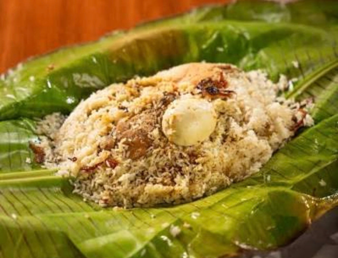 Thalassery Chicken Biriyani- Pothi Biriyani "Kaima Rice" (Banana Leaves)
